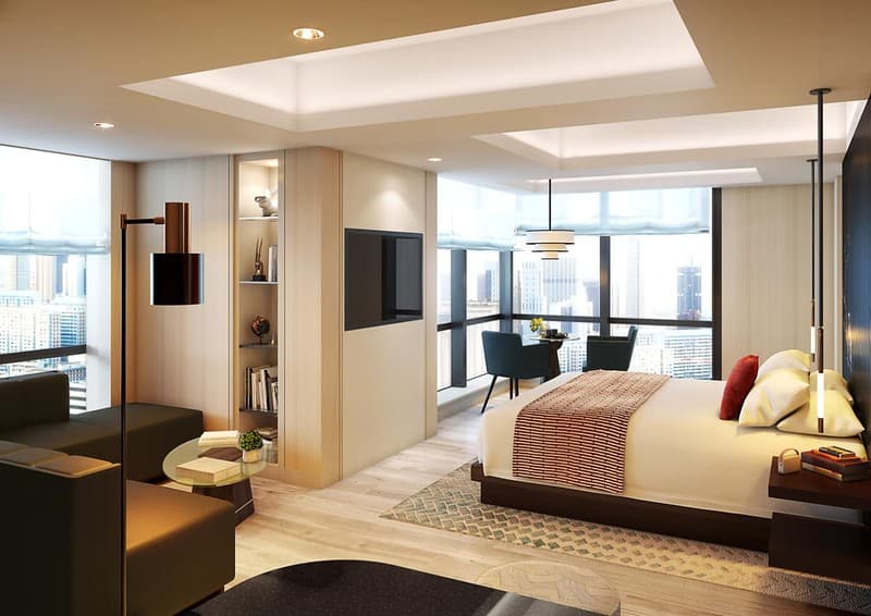 Phòng góc cho khách trong khách sạn Kimpton Shinjuku, Tokyo, Nhật Bản, với thiết kế nội thất đương đại với giường đôi, ghế sofa da hình chữ L và khu vực ghế ngồi góc Phòng góc cho khách trong khách sạn Kimpton Shinjuku, Tokyo, Nhật Bản, với thiết kế nội thất đương đại với giường đôi, ghế sofa da hình chữ L và khu vực ghế ngồi góc